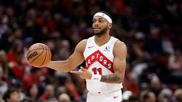 Jan 30, 2024; Chicago, Illinois, USA; Toronto Raptors forward Bruce Brown (11) brings the ball up court against the Chicago Bulls during the first half at United Center. Mandatory Credit: Kamil Krzaczynski-USA TODAY Sports